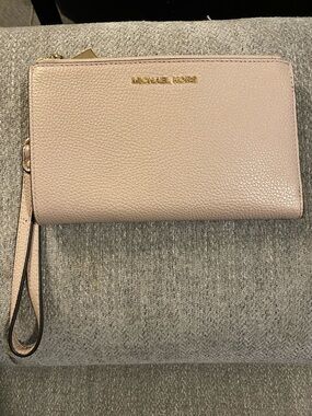 Michael Kors Pale Blush Pebbled Leather Wristlet with Gold Logo